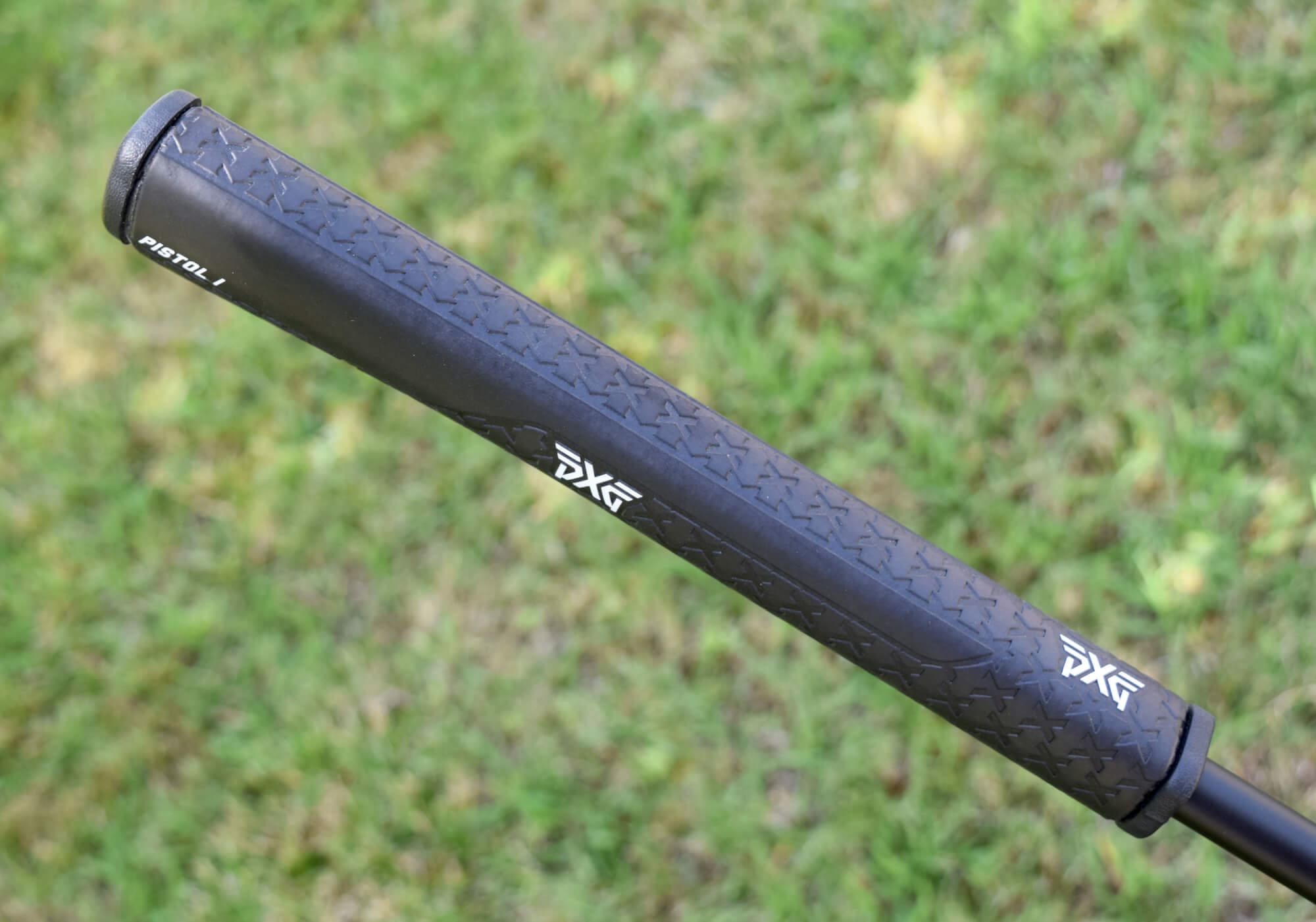 PXG「Allan」パターのピストル型グリップ。PXGロゴ入りブラックデザインで、握りやすさと安定したストロークを実現。